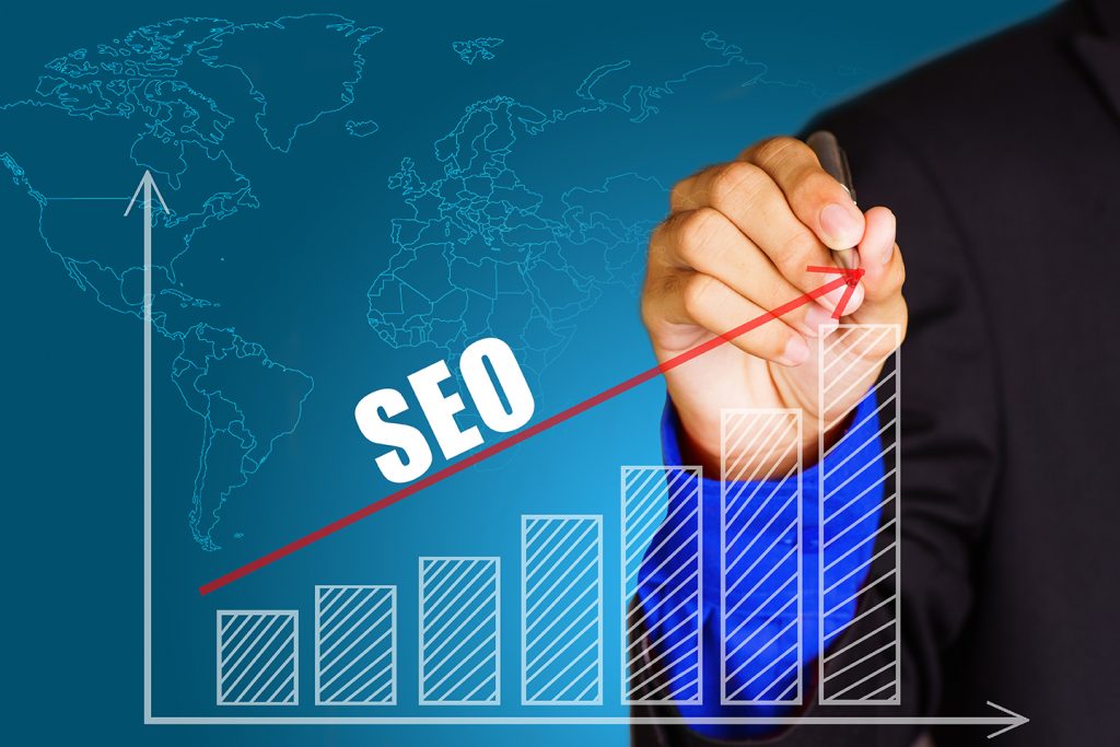 Business man drawing graph for SEO